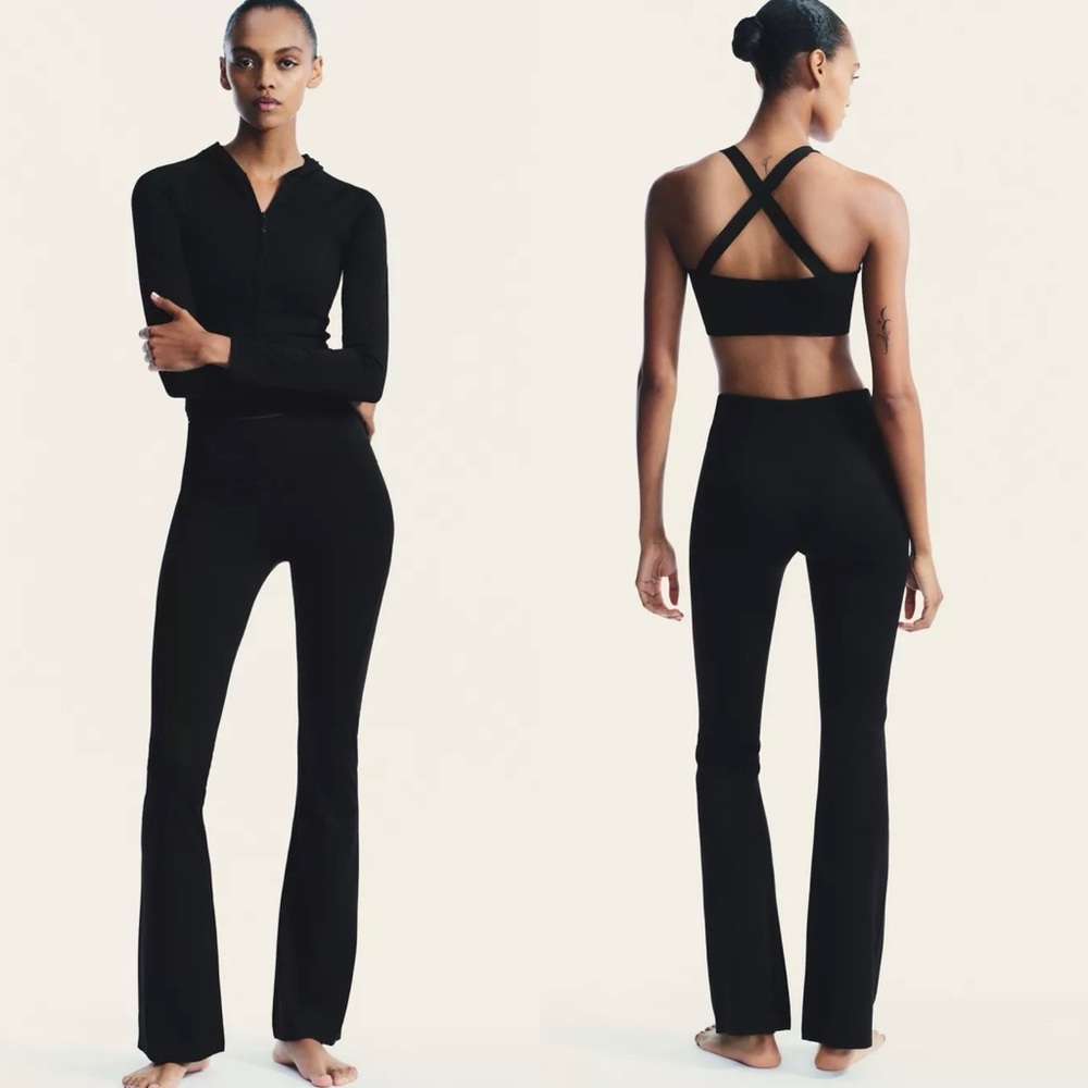 ZARA Pants, Mid-rise and elastic waistband. Flared hem.